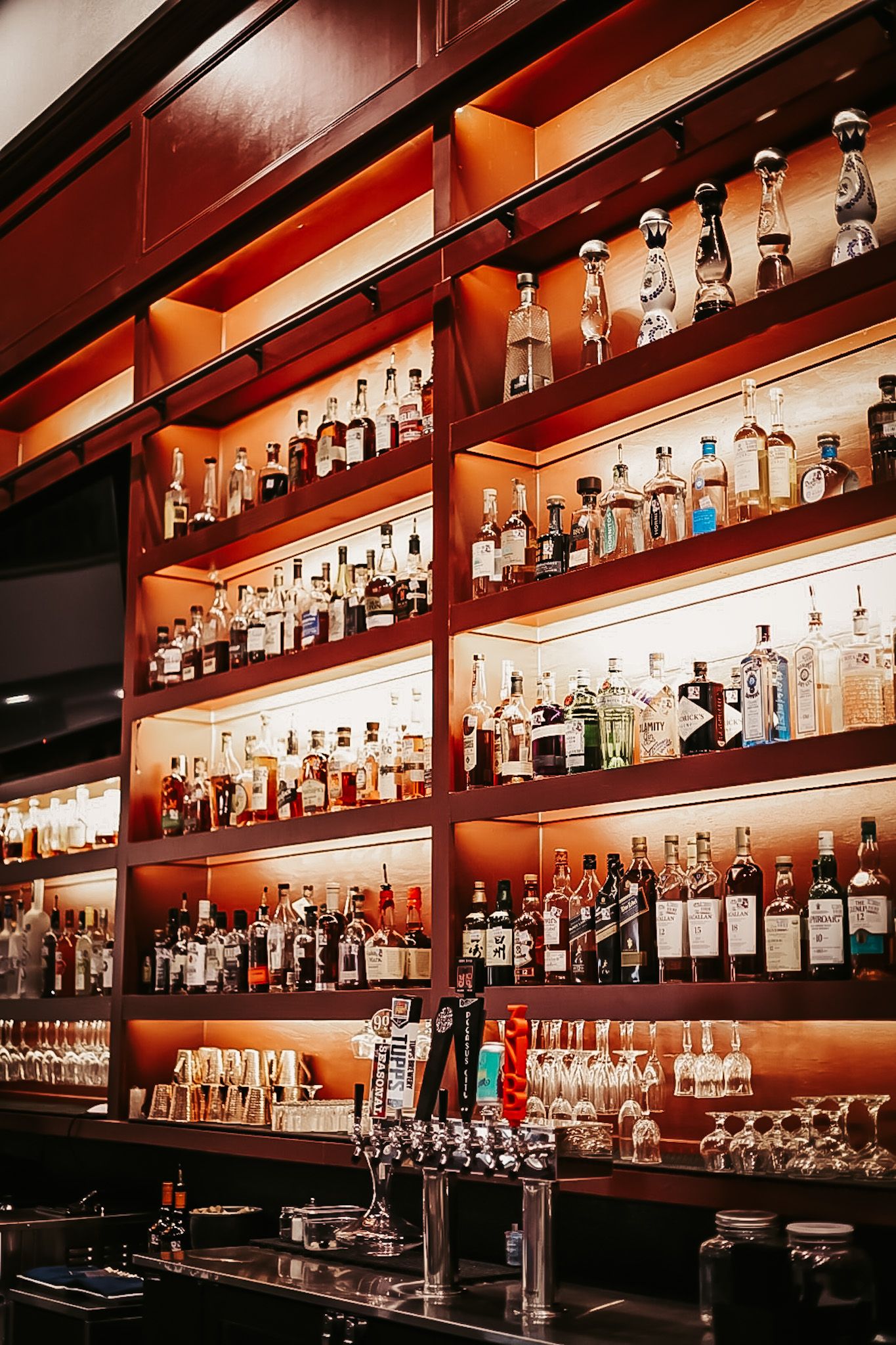 The whiskey wall at Doc’s Lounge